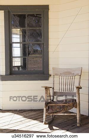 Rocking chair by window at porch; Santa Fe; New Mexico; United States View Large Photo Image Stock Photo - Rocking chair by window at porch; Santa Fe; New Mexico; United States. Fotosearch