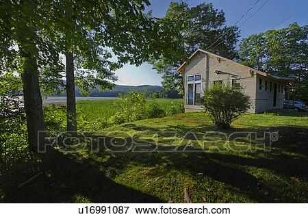 Scenic shot of a cabin with clapboard siding by lake at Burlington; Vermont; USA View Large Photo Image Stock Photo - Scenic shot of a cabin with clapboard siding by lake at Burlington; Vermont; USA. Fotosearch