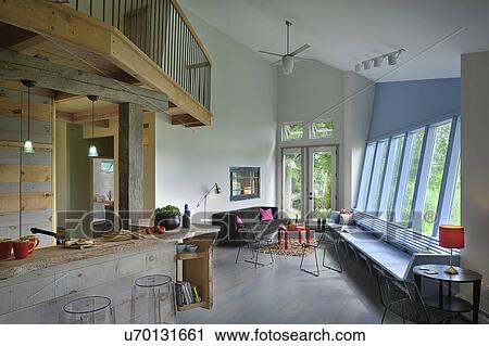 Split-level open plan living room and kitchen at home; Burlington; Vermont; USA View Large Photo Image Stock Image - Split-level open plan living room and kitchen at home; Burlington; Vermont; USA. Fotosearch