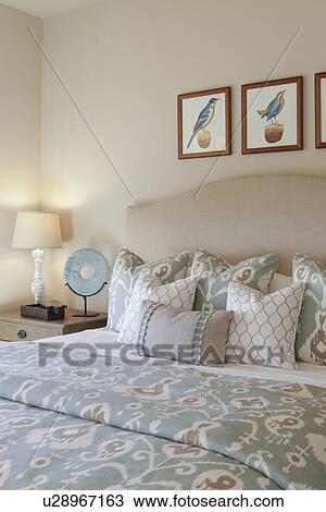 Table lamp by tidy bed in the bedroom at home; Santa Fe; New Mexico; USA View Large Photo Image Stock Image - Table lamp by tidy bed in the bedroom at home; Santa Fe; New Mexico; USA. Fotosearch