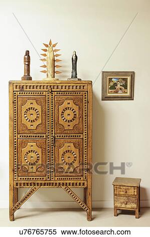 View of closed cabinet with spiritual artifacts against the wall; Santa Fe; New Mexico; USA View Large Photo Image Stock Photography - View of closed cabinet with spiritual artifacts against the wall; Santa Fe; New Mexico; USA. Fotosearch