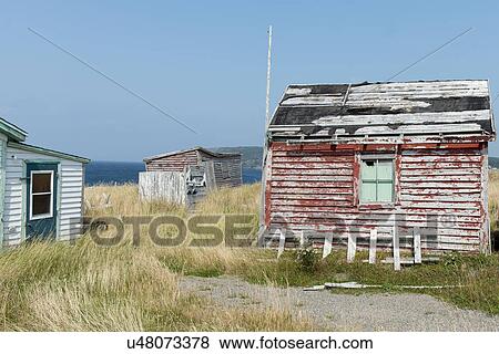 Stock Photo - Abandoned houses at Newman's Cove, Bonavista Peninsula, Newfoundland And Labrador, Canada. Fotosearch