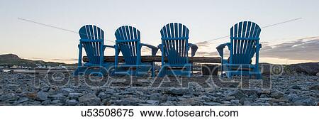 Stock Photography - Adirondack chairs on the beach, Twillingate, South Twillingate Island, Newfoundland And Labrador, Canada. Fotosearch