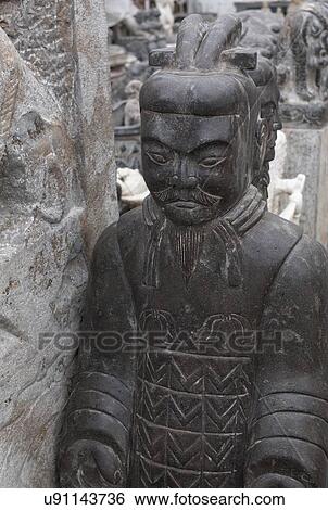 Stock Photograph - Antique statue in Panjiayuan antique market, Beijing, China. Fotosearch