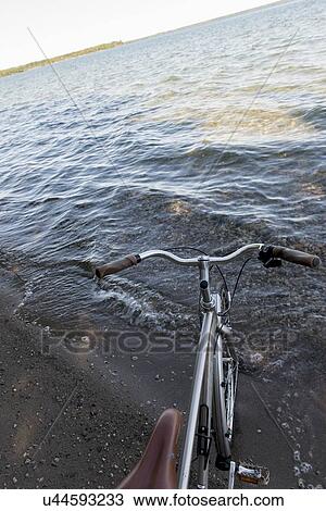 Bicycle on the beach, Wasagaming, Riding Mountain National Park, Manitoba, Canada View Large Photo Image Stock Image - Bicycle on the beach, Wasagaming, Riding Mountain National Park, Manitoba, Canada. Fotosearch