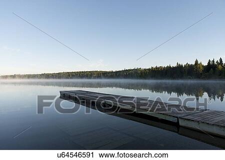 Boardwalk in a lake, Riding Mountain National Park, Manitoba, Canada View Large Photo Image Stock Image - Boardwalk in a lake, Riding Mountain National Park, Manitoba, Canada. Fotosearch