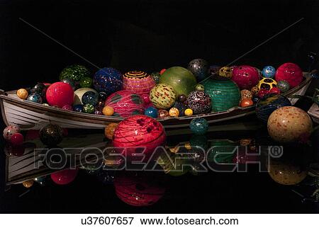 Stock Photo - Boat of glass sculpture at the Chihuly Garden and Glass Museum, Seattle Center, Seattle, Washington State, USA. Fotosearch
