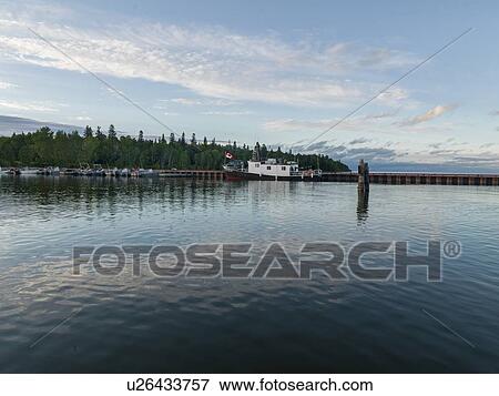 Stock Photo - Boats along dock, Lake Winnipeg, Riverton, Hecla Grindstone Provincial Park, Manitoba, Canada. Fotosearch