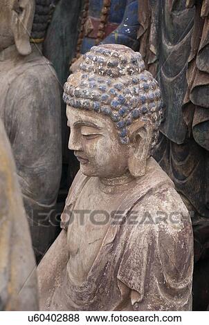 Buddha statue in Panjiayuan antique market, Beijing, China View Large Photo Image Stock Photo - Buddha statue in Panjiayuan antique market, Beijing, China. Fotosearch