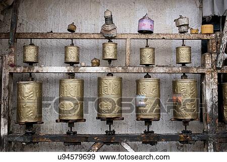 Stock Photo - Buddhist prayer wheels in a temple, Lhasa, Tibet, China. Fotosearch