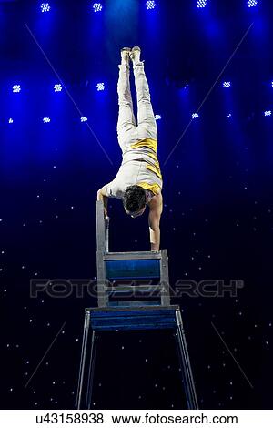 Chinese Acrobat performing, Beijing, China View Large Photo Image Stock Photo - Chinese Acrobat performing, Beijing, China. Fotosearch