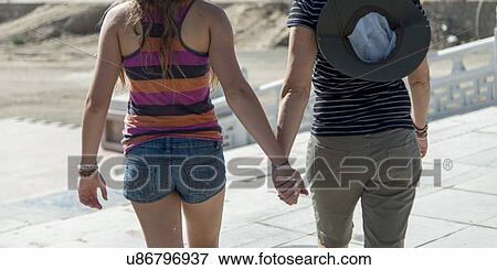 Stock Photo - Couple at Lei Yinsi Temple, Dunhuang, Jiuquan, Gansu Province, China. Fotosearch