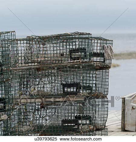Stock Photography - Crab traps stacked, Parson's Pond, Newfoundland And Labrador, Canada. Fotosearch
