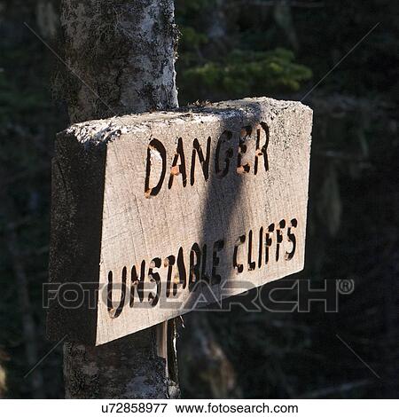 Stock Photo - Danger sign at coast, Skerwink Trail, Bonavista Peninsula, Newfoundland And Labrador, Canada. Fotosearch