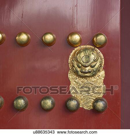 Stock Image - Detail of a door, Forbidden City, Xicheng District, Beijing, China. Fotosearch