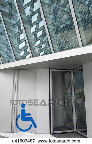 Disabled sign at the entrance of Seattle Central Library, Seattle, Washington State, USA View Large Photo Image Stock Photo - Disabled sign at the entrance of Seattle Central Library, Seattle, Washington State, USA. Fotosearch