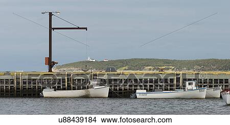 Picture - Fishing boats at dock, Rocky Harbor, Norris Point, Gros Morne National Park, Newfoundland And Labrador, Canada. Fotosearch