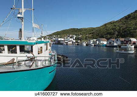 Stock Photo - Fishing trawler at Petty Harbor-Maddox Cove, St. John's, Avalon Peninsula, Newfoundland And Labrador, Canada. Fotosearch