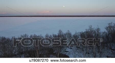 Stock Image - Frozen lake in winter, Lake Winnipeg, Riverton, Hecla Grindstone Provincial Park, Manitoba, Canada. Fotosearch