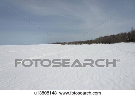 Stock Photo - Frozen lake in winter, Lake Winnipeg, Riverton, Hecla Grindstone Provincial Park, Manitoba, Canada. Fotosearch