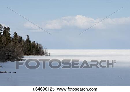 Stock Photography - Frozen lake in winter, Lake Winnipeg, Riverton, Hecla Grindstone Provincial Park, Manitoba, Canada. Fotosearch
