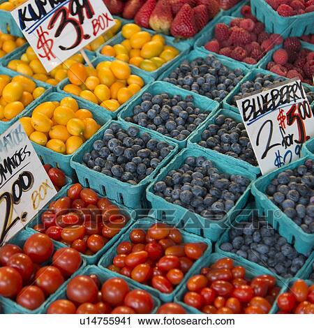 Stock Image - Fruits and vegetables for sale at a market stall, Pike Place Market, Seattle, Washington State, USA. Fotosearch