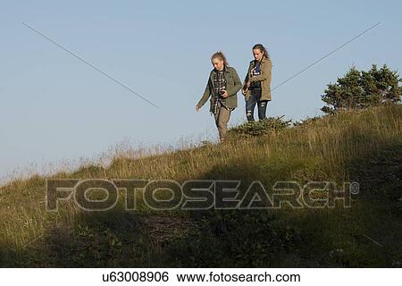 Girls along Skerwink Trail, Port Rexton, Bonavista Peninsula, Newfoundland And Labrador, Canada View Large Photo Image Stock Photograph - Girls along Skerwink Trail, Port Rexton, Bonavista Peninsula, Newfoundland And Labrador, Canada. Fotosearch