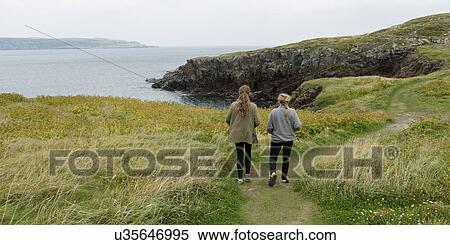 Stock Photography - Girls at North Bird Island, Little Catalina, Bonavista Peninsula, Newfoundland And Labrador, Canada. Fotosearch
