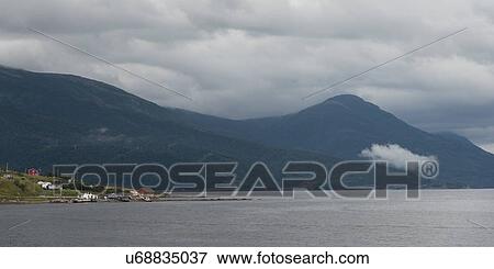 Stock Photo - Houses along the coast, Bonne Bay, Norris Point, Gros Morne National Park, Newfoundland And Labrador, Canada. Fotosearch