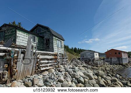 Stock Image - Houses at the coast, Norris Point, Gros Morne National Park, Newfoundland And Labrador, Canada. Fotosearch