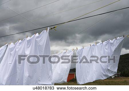 Stock Image - Laundry hanging to dry, Norris Point, Rocky Harbor, Gros Morne National Park, Newfoundland And Labrador, Canada. Fotosearch