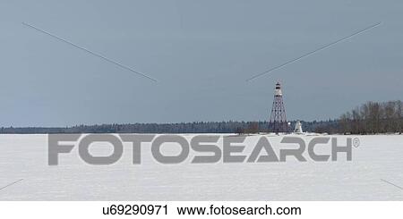 Stock Image - Lighthouse and watch tower at the frozen lakeside, Riverton, Hecla Grindstone Provincial Park, Manitoba, Canada. Fotosearch
