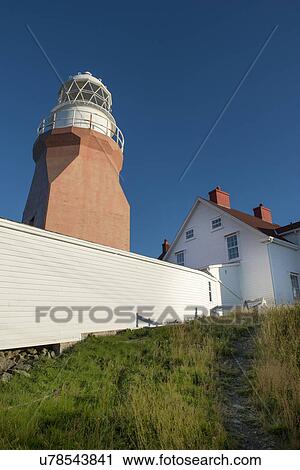 Stock Image - Long Point Lighthouse in Crow Head, Twillingate, North Twillingate Island, Newfoundland And Labrador, Canada. Fotosearch