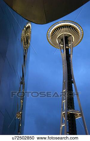 Stock Image - Low angle view of EMP Museum and Space Needle, Seattle, Washington State, USA. Fotosearch