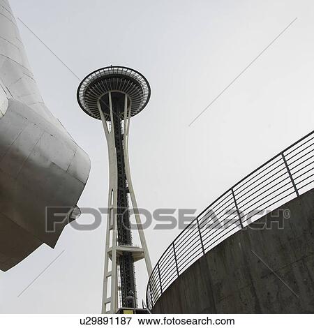 Low angle view of EMP Museum and Space Needle, Seattle, Washington State, USA View Large Photo Image Stock Photo - Low angle view of EMP Museum and Space Needle, Seattle, Washington State, USA. Fotosearch