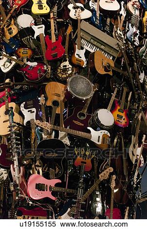 Stock Photography - Musical Instrument Sculpture tower at EMP Museum, Seattle, Washington State, USA. Fotosearch