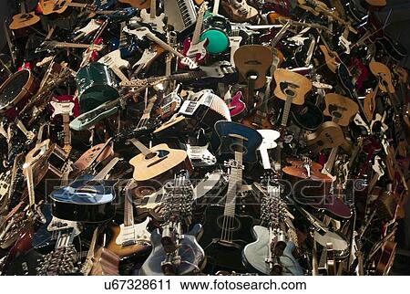 Stock Image - Musical Instrument tower sculpture at EMP Museum, Seattle, Washington State, USA. Fotosearch