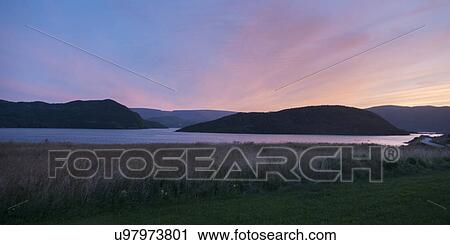 Stock Image - Ocean at sunset, Bonne Bay, Norris Point, Gros Morne National Park, Newfoundland And Labrador, Canada. Fotosearch