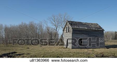 Old abandoned barn in a field, Manitoba, Canada View Large Photo Image Stock Photograph - Old abandoned barn in a field, Manitoba, Canada. Fotosearch