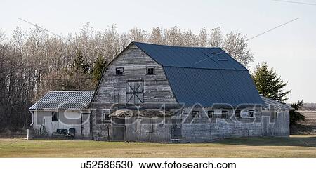 Old barn in a field, Manitoba, Canada View Large Photo Image Stock Image - Old barn in a field, Manitoba, Canada. Fotosearch