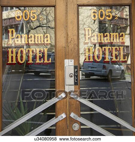 Stock Photo - Panama Hotel sign on exterior door, Nihonmachi, International District, Seattle, Washington State, USA. Fotosearch