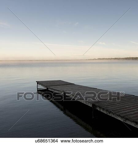 Pier in a lake, Riding Mountain National Park, Manitoba, Canada View Large Photo Image Picture - Pier in a lake, Riding Mountain National Park, Manitoba, Canada. Fotosearch
