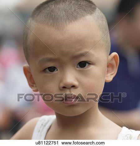 Stock Image - Portrait of a boy, Forbidden City, Xicheng District, Beijing, China. Fotosearch