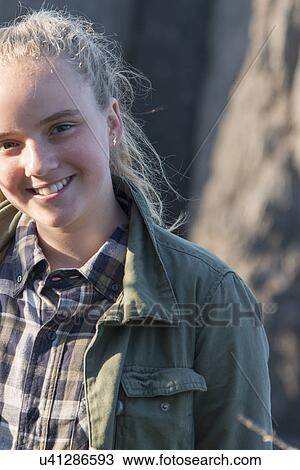 Portrait of a girl smiling, Skerwink Trail, Port Rexton, Bonavista Peninsula, Newfoundland And Labrador, Canada View Large Photo Image Stock Image - Portrait of a girl smiling, Skerwink Trail, Port Rexton, Bonavista Peninsula, Newfoundland And Labrador, Canada. Fotosearch