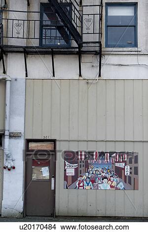 Picture - Poster on the exterior wall of a building, Seattle, Washington State, USA. Fotosearch