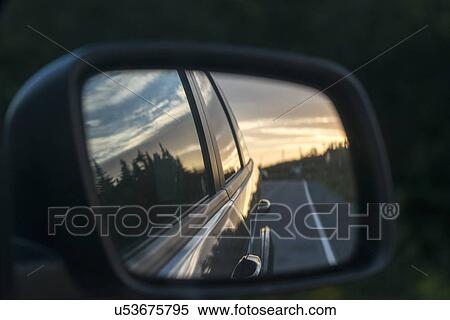 Reflection of car in a side-view mirror, Avalon Peninsula, Newfoundland and Labrador, Canada View Large Photo Image Stock Photography - Reflection of car in a side-view mirror, Avalon Peninsula, Newfoundland and Labrador, Canada. Fotosearch