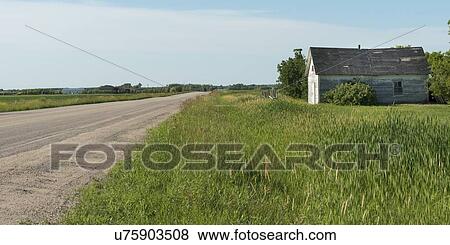 Road passing through a prairie field, East Selkirk, Manitoba, Canada View Large Photo Image Stock Photo - Road passing through a prairie field, East Selkirk, Manitoba, Canada. Fotosearch