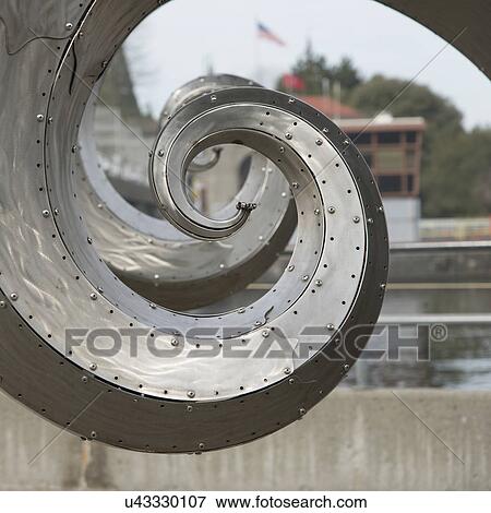 Stock Photo - Salmon Waves Sculpture at Hiram M. Chittenden Locks, Carl S. English Jr. Botanical Garden, Lake Washington Ship Canal, Seattle, Washington State, USA. Fotosearch