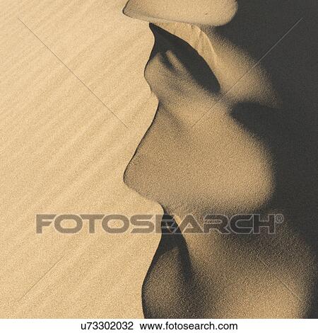 Stock Image - Singing sand dunes at Mingsha Shan, Gobi Desert, Dunhuang, Jiuquan, Gansu Province, China. Fotosearch