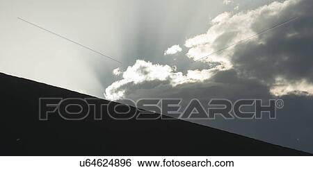 Stock Photograph - Sunset over sand dune at Mingsha Shan, Dunhuang, Jiuquan, Gansu Province, China. Fotosearch